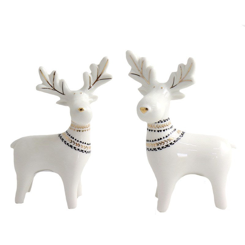 Two Assorted White Ceramic Deer