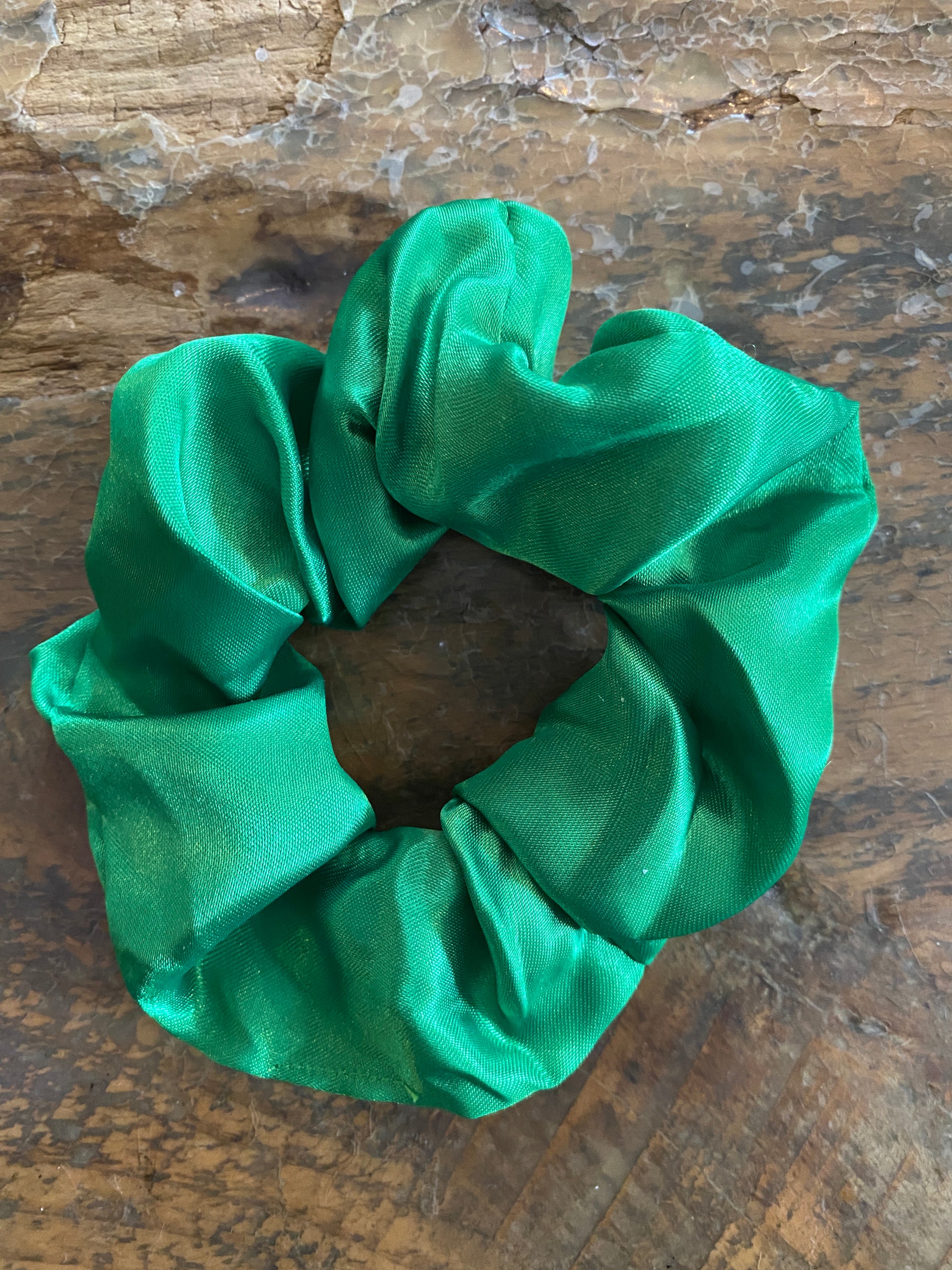 Dark green satin scrunchy hair tie