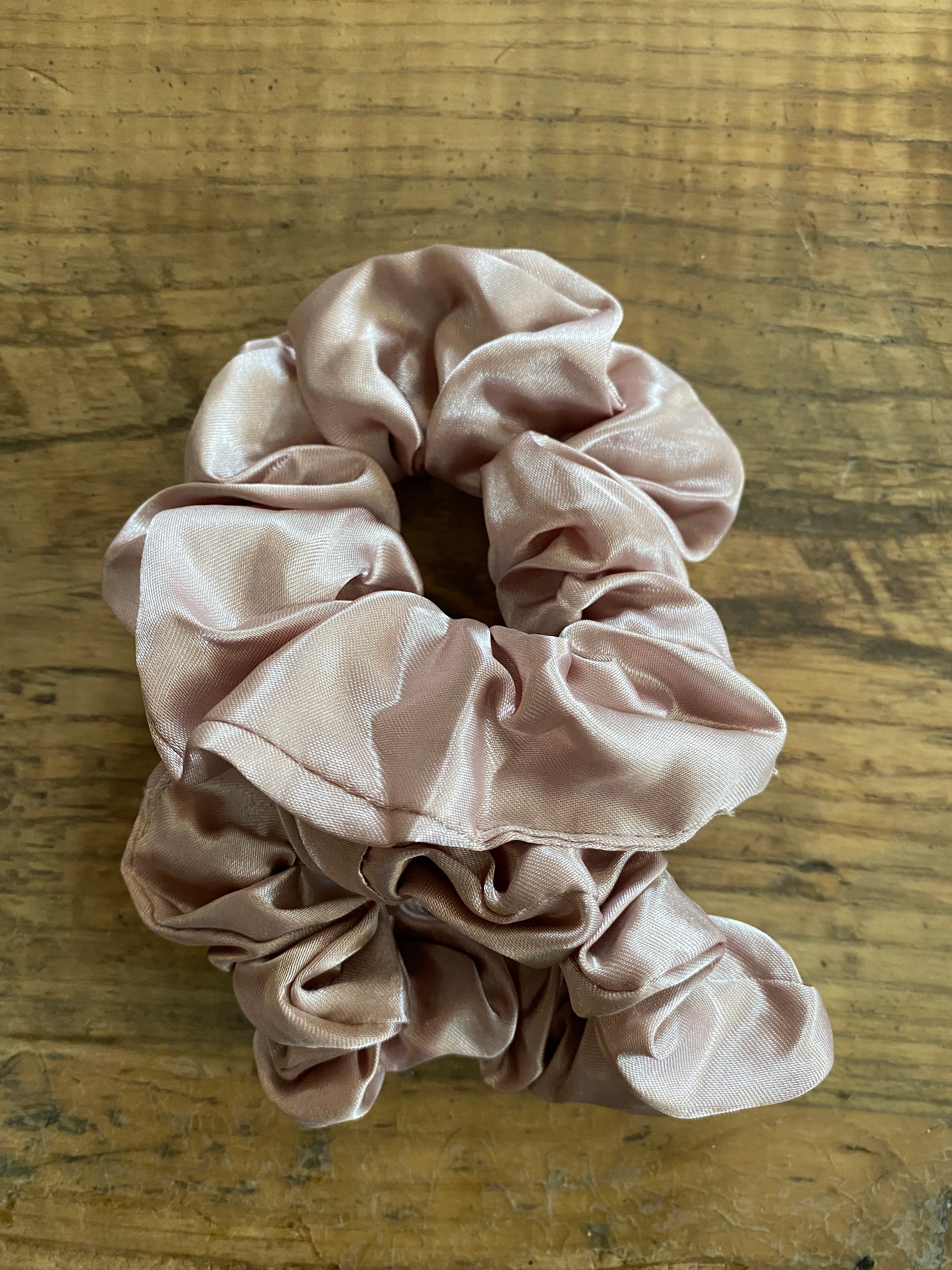 Blush with gray undertones coloured satin scrunchy hair tie.