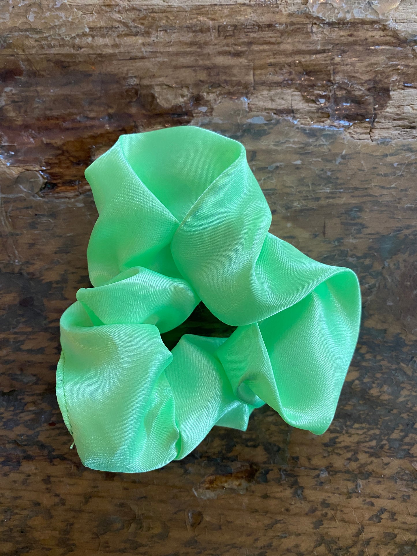 Bright lime green satin scrunchy hair tie. 