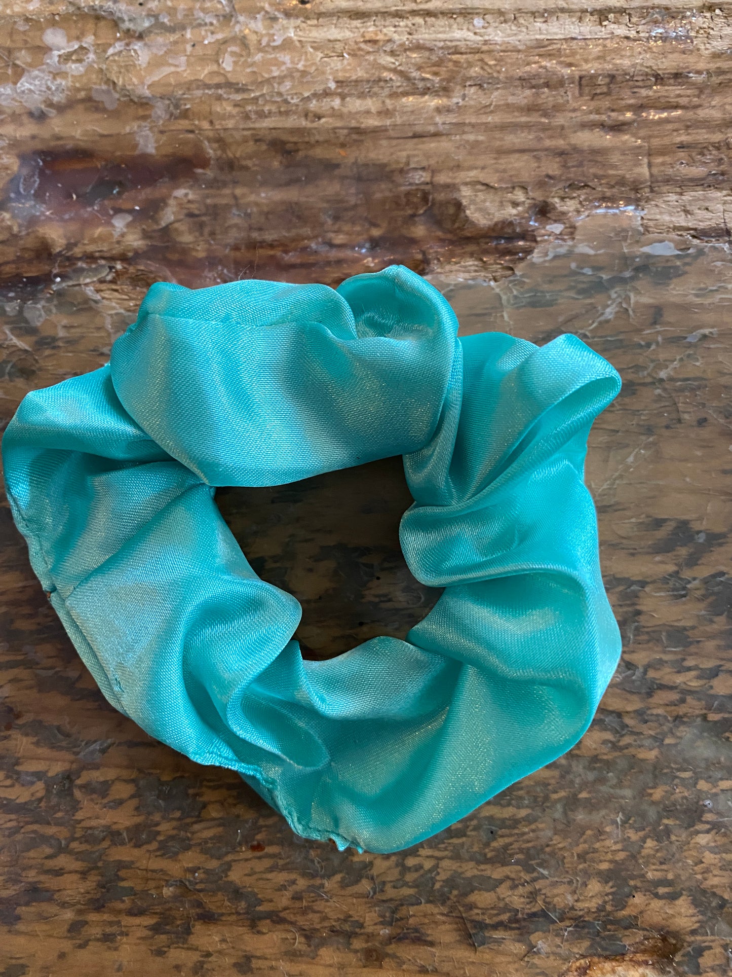 Teal satin scrunchy hair tie. 