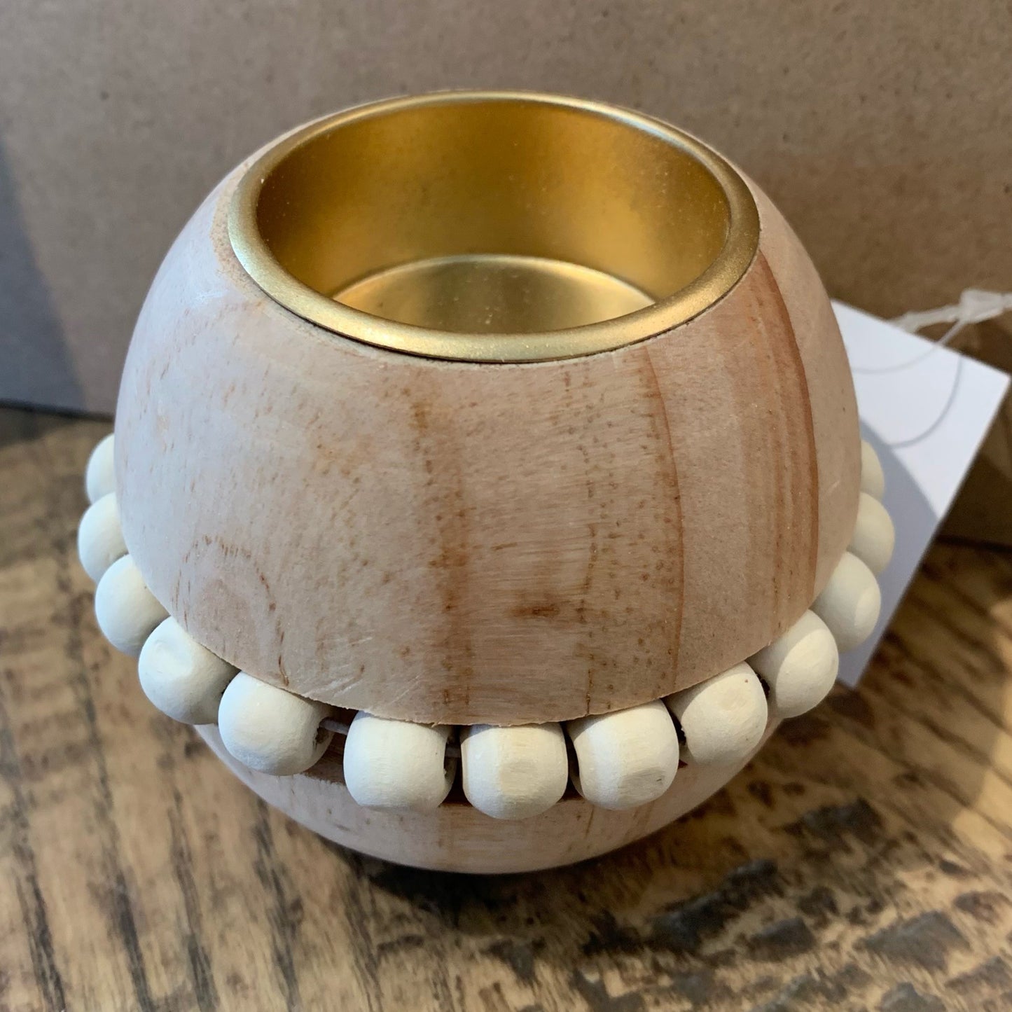 Round wooden bead tea-light holder